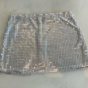 Alice+Olivia Riley Chain-Mail Miniskirt, size 4
Silver with clear rhinestones.